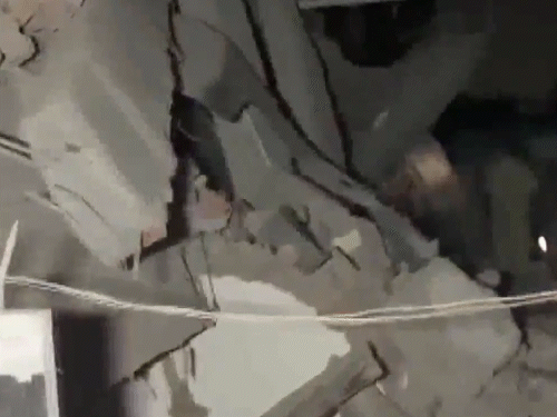 Delhi building collapse accident photos rescue operation